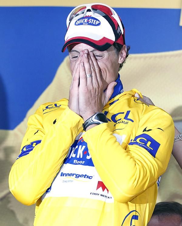 Sylvain Chavanel is overcome with emotion after donning the yellow jersey.