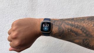 Lloyd Coombes wearing the Fitbit Versa 3 smartwatch