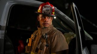 Jordan Calloway as Jake in full Fire gear at night on Fire Country.