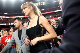 LAS VEGAS, NV - FEBRUARY 11: Taylor Swift walks off the field after Super Bowl LVIII between the Kansas City Chiefs and the San Francisco 49ers at Allegiant Stadium on February 11, 2024 in Las Vegas, NV.