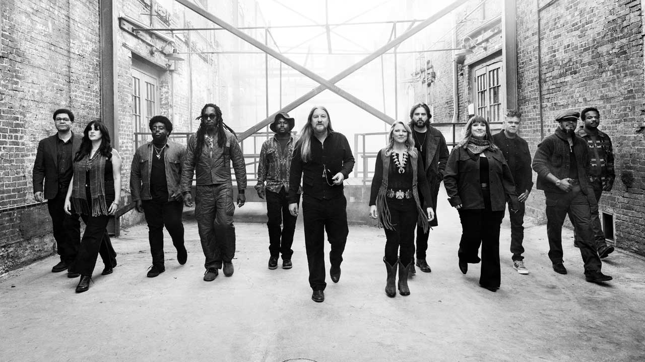 Tedeschi Trucks Band walking down an alley