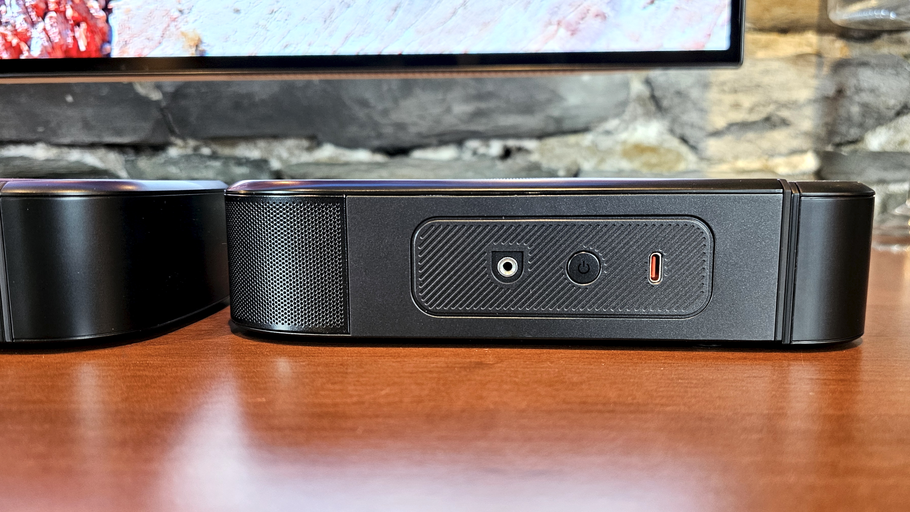 JBL Bar 1000MK2 gallery showing ports and surround speaker docking and power options