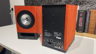 Technics SC-CX700 music system one speaker shown from front other from rear