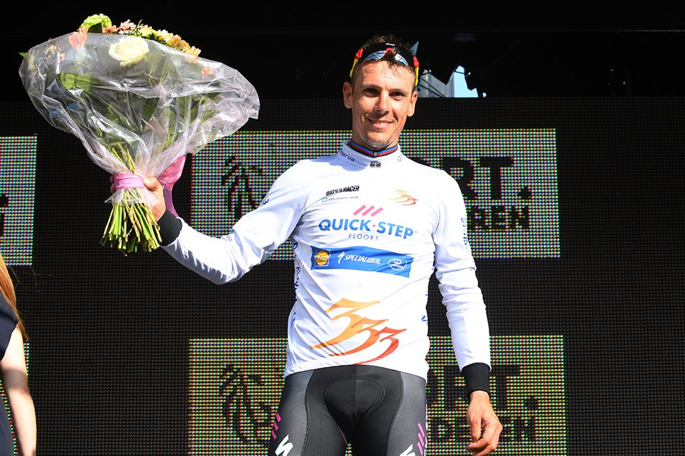 Philippe Gilbert on the podium after winning stage 1 at Three Days of De Panne