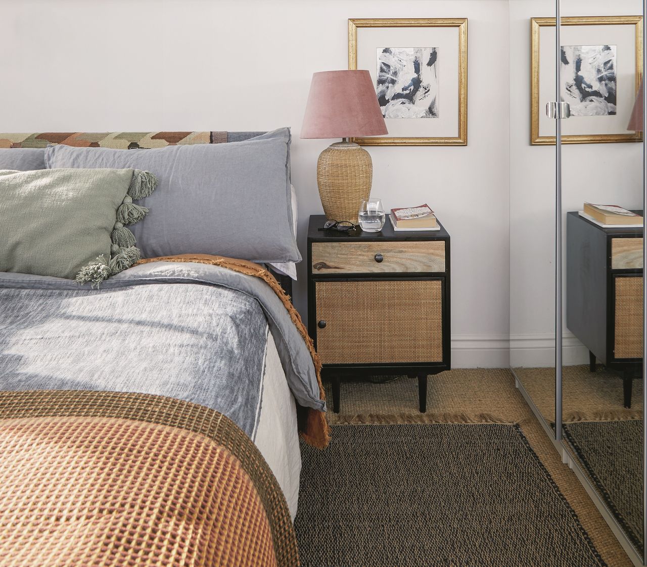  Bedroom with double bed below windows and beside mirrored wardrobe. 