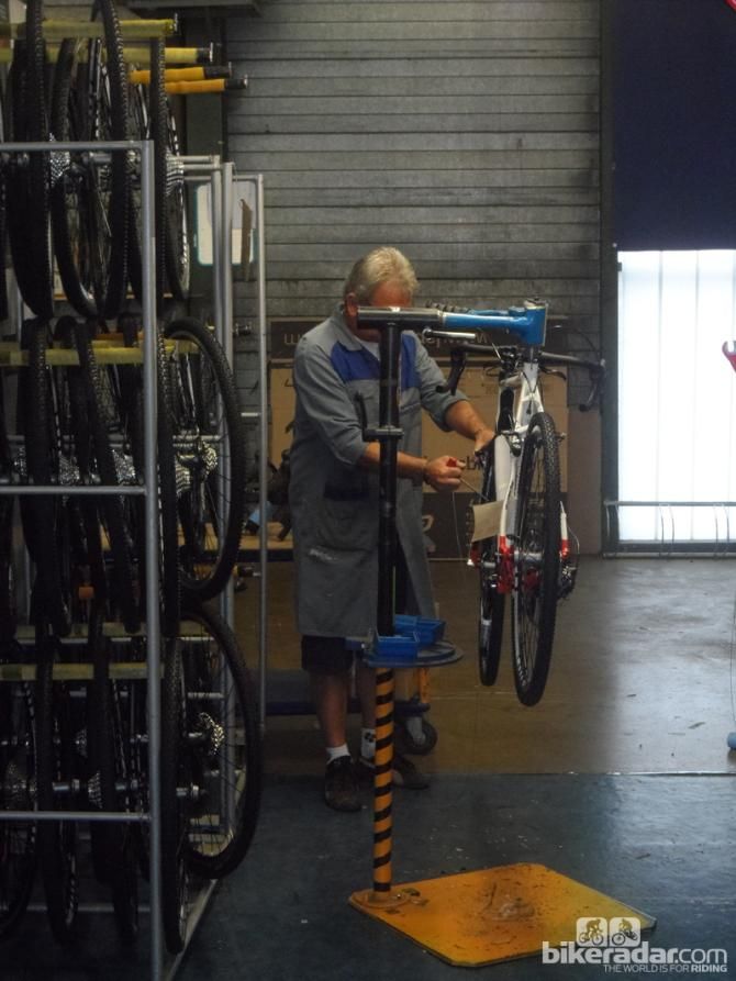 Lapierre's factory in Dijon, France, doesn't have a traditional assembly line. Each bike is assembled by one mechanic at a workstation like this