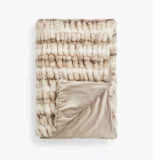 neutral faux fur throw