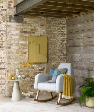 exposed brick wall and rustic shiplap wall in living room with rocking chair - sofa.com