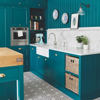 Turquoise kitchen with baskets