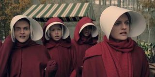 a group of Handmaids