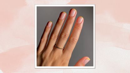 Portrait of hand with yellow French tip nails on a pink watercolour background