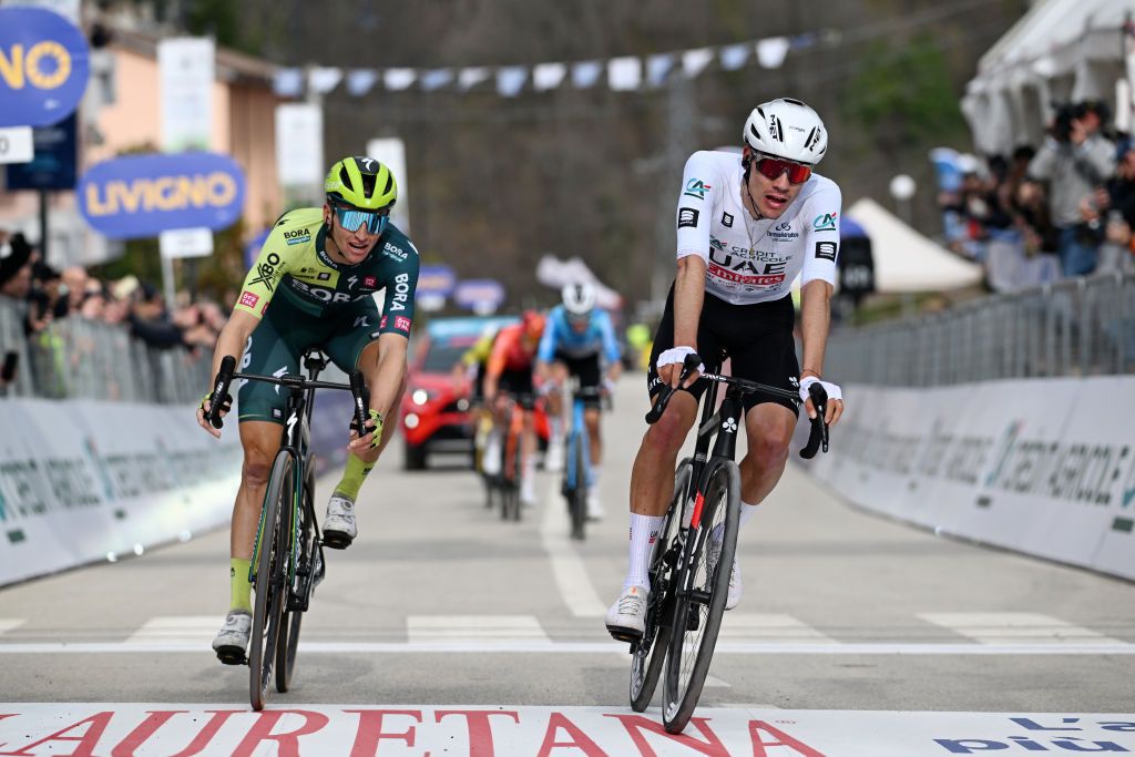 VALLE CASTELLANA ITALY MARCH 08 LR Jai Hindley of Australia and Team BoraHansgrohe and Juan Ayuso of Spain and UAE Emirates Team crosses the finish line during the 59th TirrenoAdriatico 2024 Stage 5 a 144km stage from Torricella Sicura to Valle Castellana 615m UCIWT on March 08 2024 in Valle Castellana Italy Photo by Tim de WaeleGetty Images