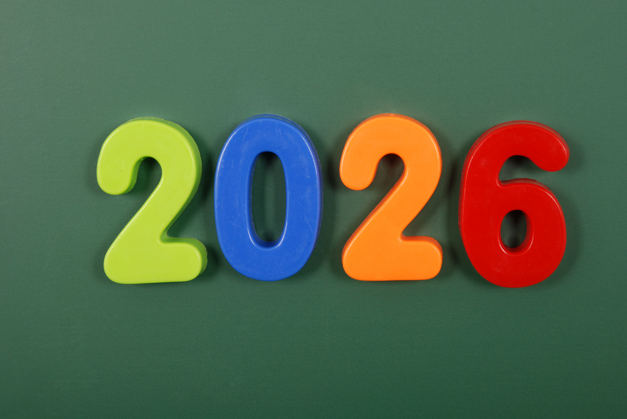 colorful 2026 numbers on a dark green background