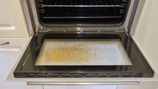Grease stains on glass oven door