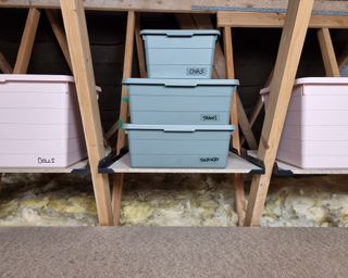 Loft leg roofing product with pastel-colored storage boxes