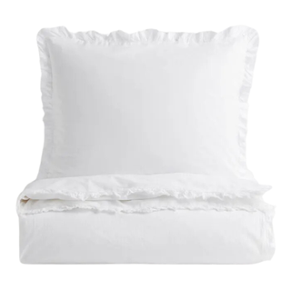 A white ruffle-trimmed bedding set