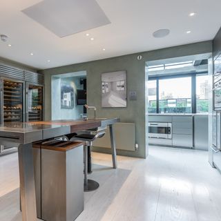 kitchen with wooden worktop and white floor