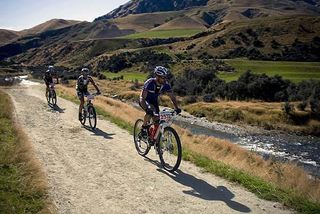 Tony Hogg leads out Marcus Roy and Kashi Leuchs in the Motatapu Icebreaker, a mountain bike race on the South Island of New Zealand.
