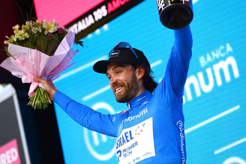 BALATONFURED HUNGARY MAY 08 Rick Zabel of Germany and Team Israel Premier Tech celebrates winning the blue mountain jersey on the podium ceremony after the 105th Giro dItalia 2022 Stage 3 a 201km stage from Kaposvr to Balatonfred Giro WorldTour on May 08 2022 in Balatonfured Hungary Photo by Tim de WaeleGetty Images