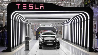 A Tesla comes off the line at a Germany plant