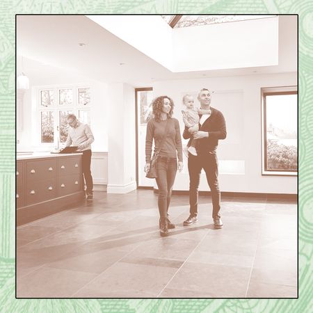 A couple and their baby tour a new home for sale.