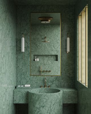A bathroom with green marble vanity