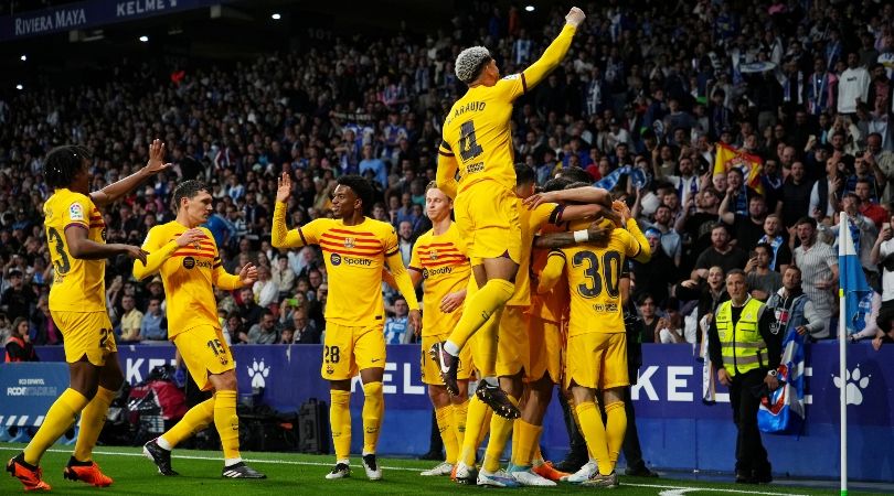 Barcelona players celebrate Robert Lewandowski&#039;s goal at Espanyol on the day they won LaLiga in May 2023.