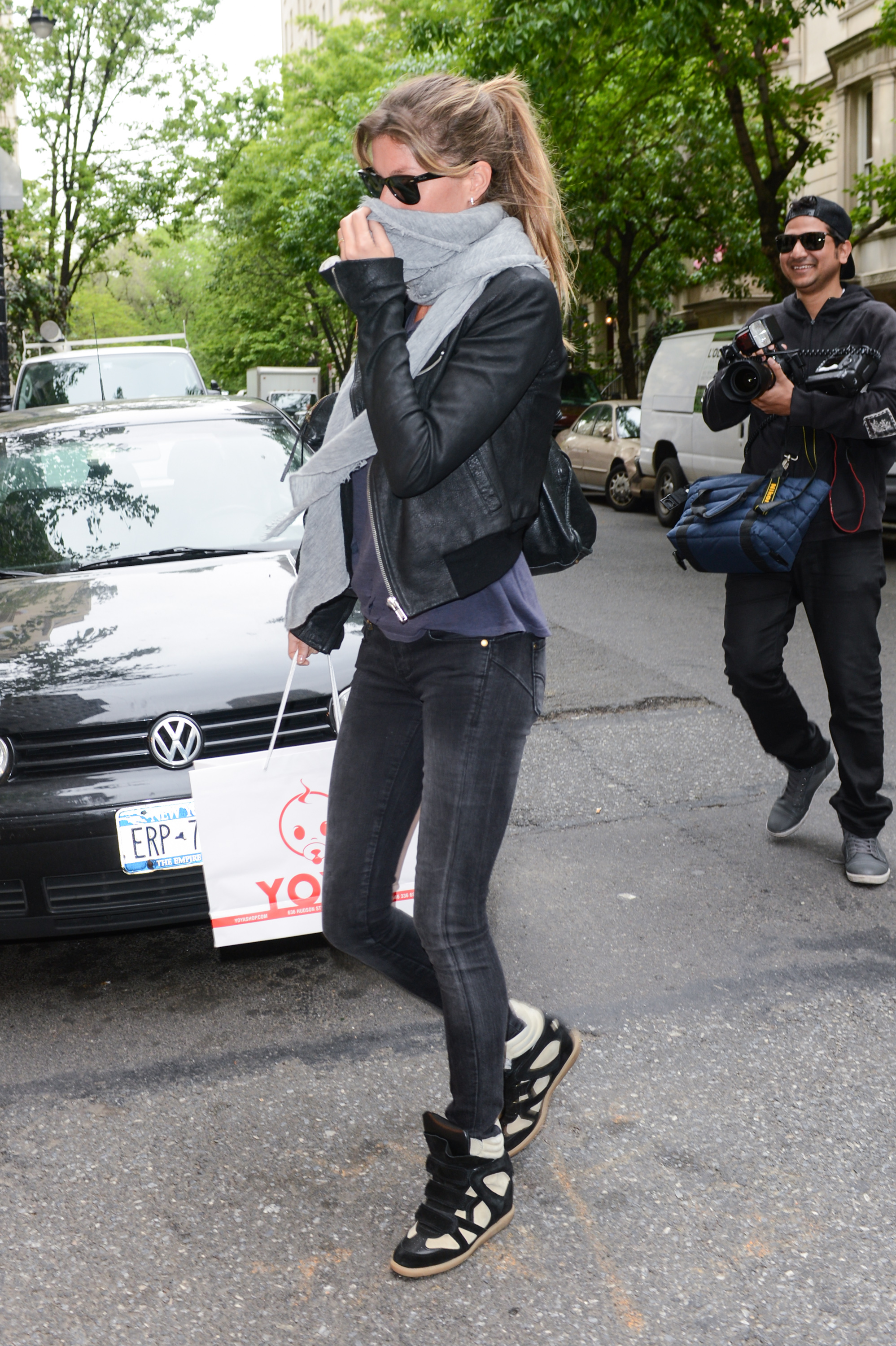 Gisele Bundchen wore Isabel Marant's wedge sneakers in 2012