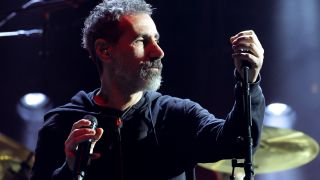 Serj Tankian performing with System Of A Down in 2022