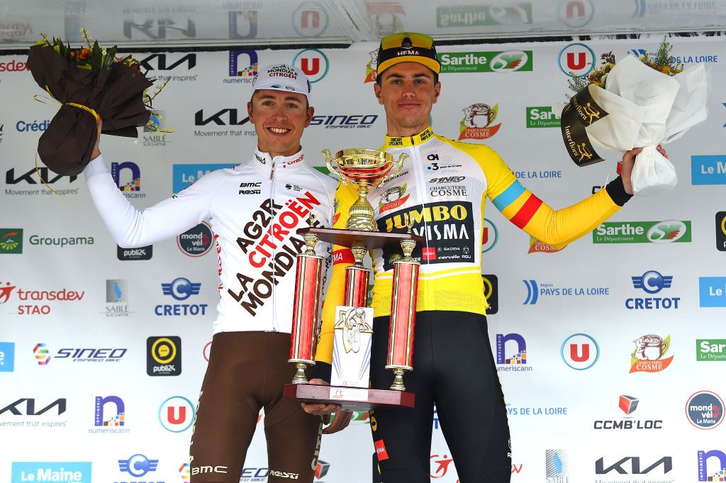 LA CHAPELLESAINTAUBIN FRANCE APRIL 08 LR Benoit Cosnefroy of France and AG2R Citren Team on second place and race winner Olav Kooij of Netherlands and Team Jumbo Visma yellow leader jersey pose on the podium ceremony after the 68th Circuit Cycliste Sarthe Pays de la Loire 2022 Stage 4 a 1364km stage shortened due to bad weather conditions from La ChapelleSaintAubin to La ChapelleSaintAubin CircuitSarthe on April 08 2022 in La ChapelleSaintAubin France Photo by Dario BelingheriGetty Images