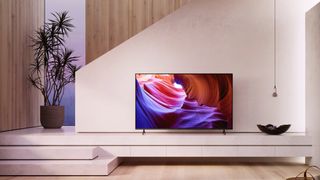 Sony XR X90K TV in a white living room