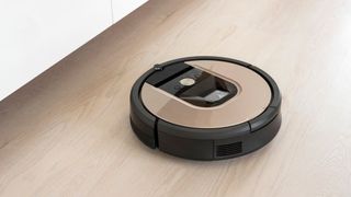 automated vacuum cleaning robot powered by rechargeable battery in modern living room