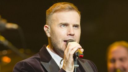 LONDON, ENGLAND - DECEMBER 06:Gary Barlow performs at a concert in support of The Prince's Trust and The Foundation of Prince William and Prince Harry at the Royal Albert Hall on December 6, 