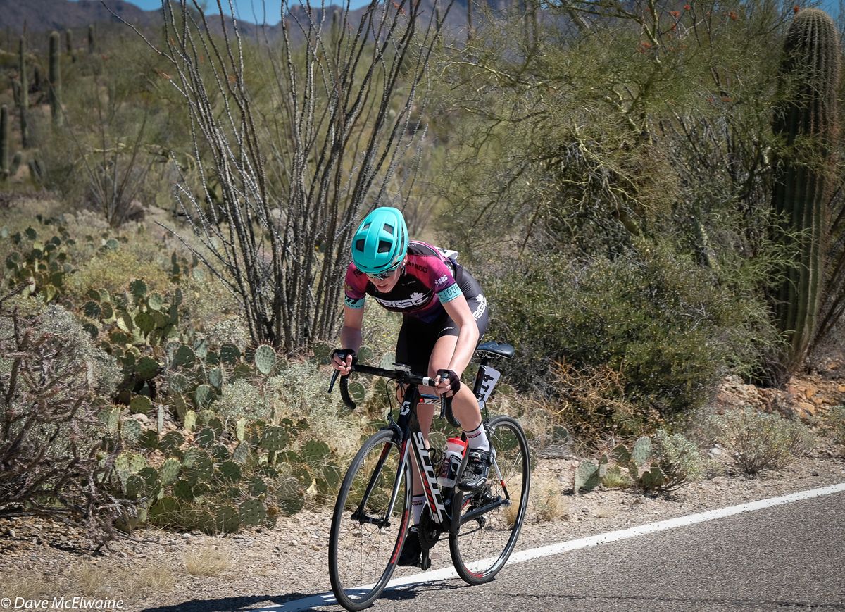 Ruby West riding the downhill portion of the time trial