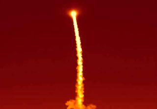 NASA's Wide-field Infrared Survey Explorer, or WISE, streaks skyward in this infrared image of the launch on Dec. 14, 2009 from Vandenberg Air Force Base, Calif.