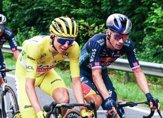 Slovenian Tadej Pogacar of UAE Team Emirates and Slovenian Primoz Roglic of Red Bull-Bora-Hansgrohe pictured in action during stage 5 of the 2024 Tour de France cycling race, from Saint-Jean-de-Maurienne to Saint-Vulbas, France (177,4 km) on Wednesday 03 July 2024. The 111th edition of the Tour de France starts on Saturday 29 June and will finish in Nice, France on 21 July. BELGA PHOTO POOL LUCA BETTINI (Photo by POOL LUCA BETTINI / BELGA MAG / Belga via AFP) (Photo by POOL LUCA BETTINI/BELGA MAG/AFP via Getty Images)