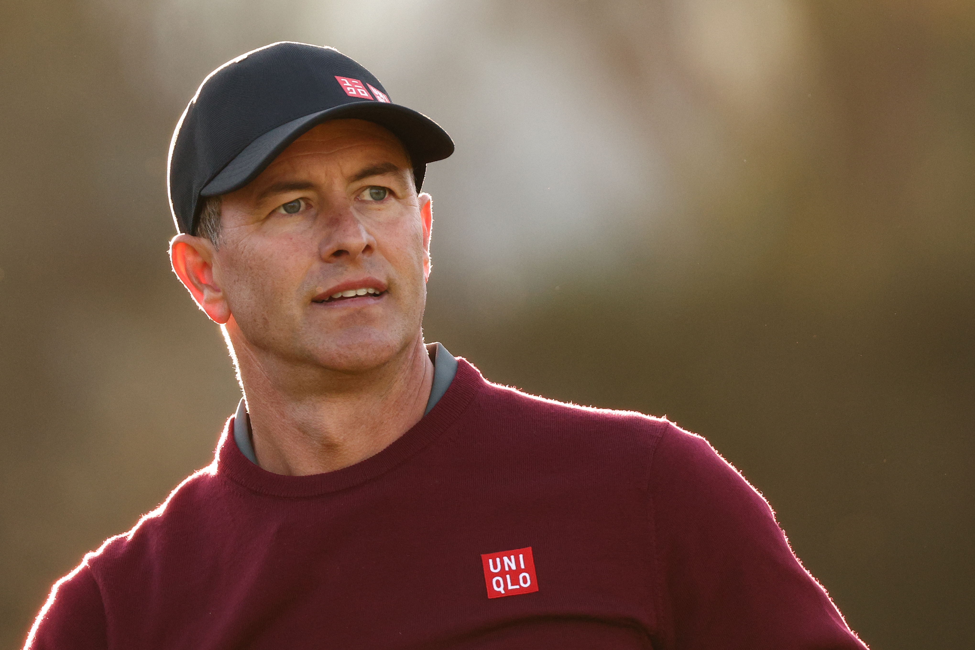 Adam Scott stares into the distance