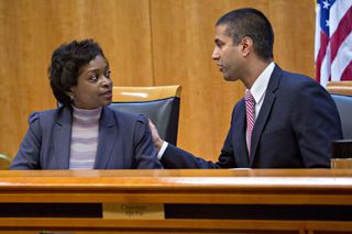 Former FCC chiefs Mignon Clyburn and Ajit Pai at a 2017 public meeting. 