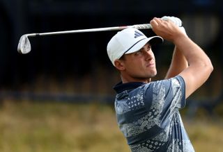 Ludvig Aberg holds his finish on a wedge shot