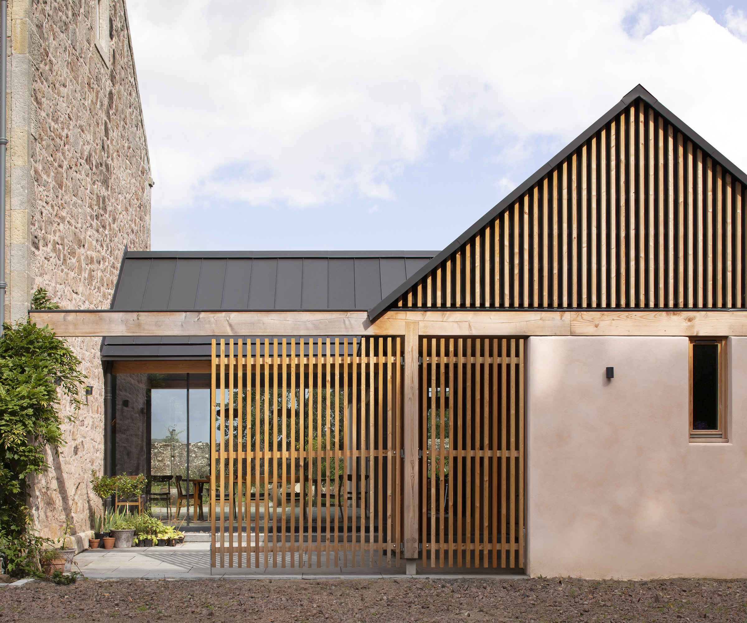 A contemporary side extension on a B listed Georgian manor