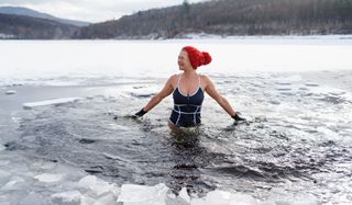 Woman taking a freezing cold swim