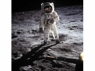 Astronaut Buzz Aldrin, lunar module pilot, walks on the surface of the Moon during the Apollo 11 mission, July 1969.