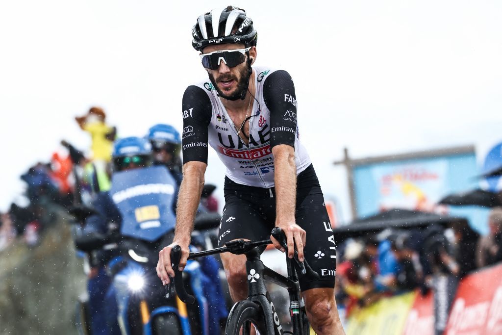 UAE Team Emirates British rider Adam Yates reacts as he crosses the finish line in secondplaced during the seventh stage of the 75th edition of the Criterium du Dauphine cycling race 148km between Port de Savoie to Col de la Croix de Fer Saint Sorlin France on June 10 2023 Photo by AnneChristine POUJOULAT AFP Photo by ANNECHRISTINE POUJOULATAFP via Getty Images