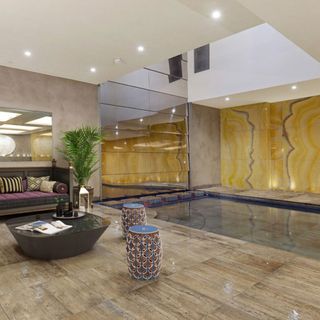 basement swimming pool with sofa