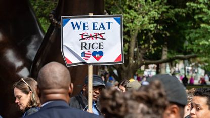 People participate in a rally in solidarity with the Haitian community at Boston Common in Boston on September 24, 2024