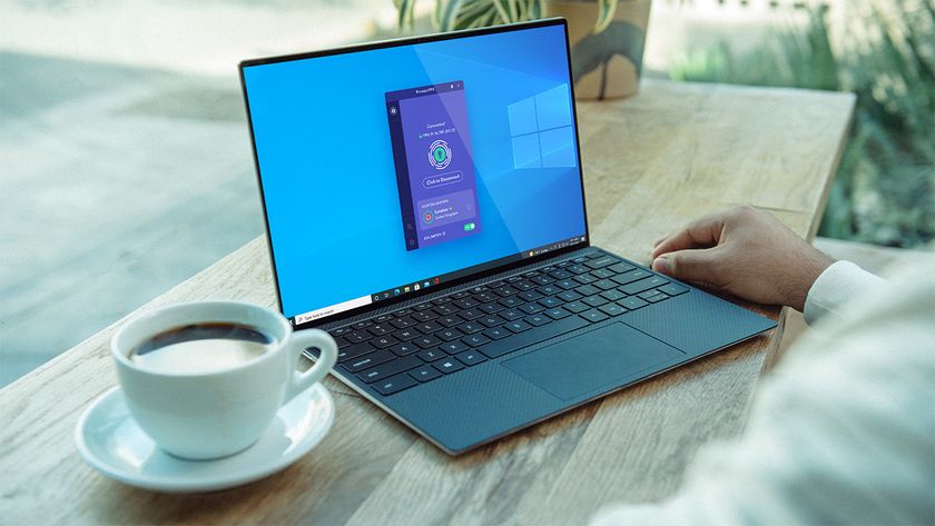 PrivadoVPN app home screen on Windows laptop being used by person in a cafe