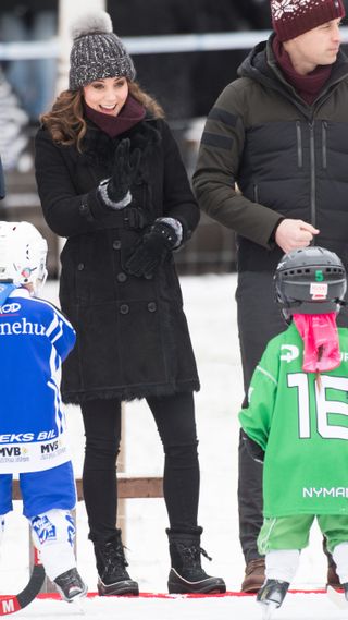 Kate Middleton waves as she attends a Bandy hockey match in 2018