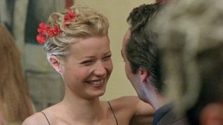 Gwyneth Paltrow smiling with flowers in her hair in Sliding Doors