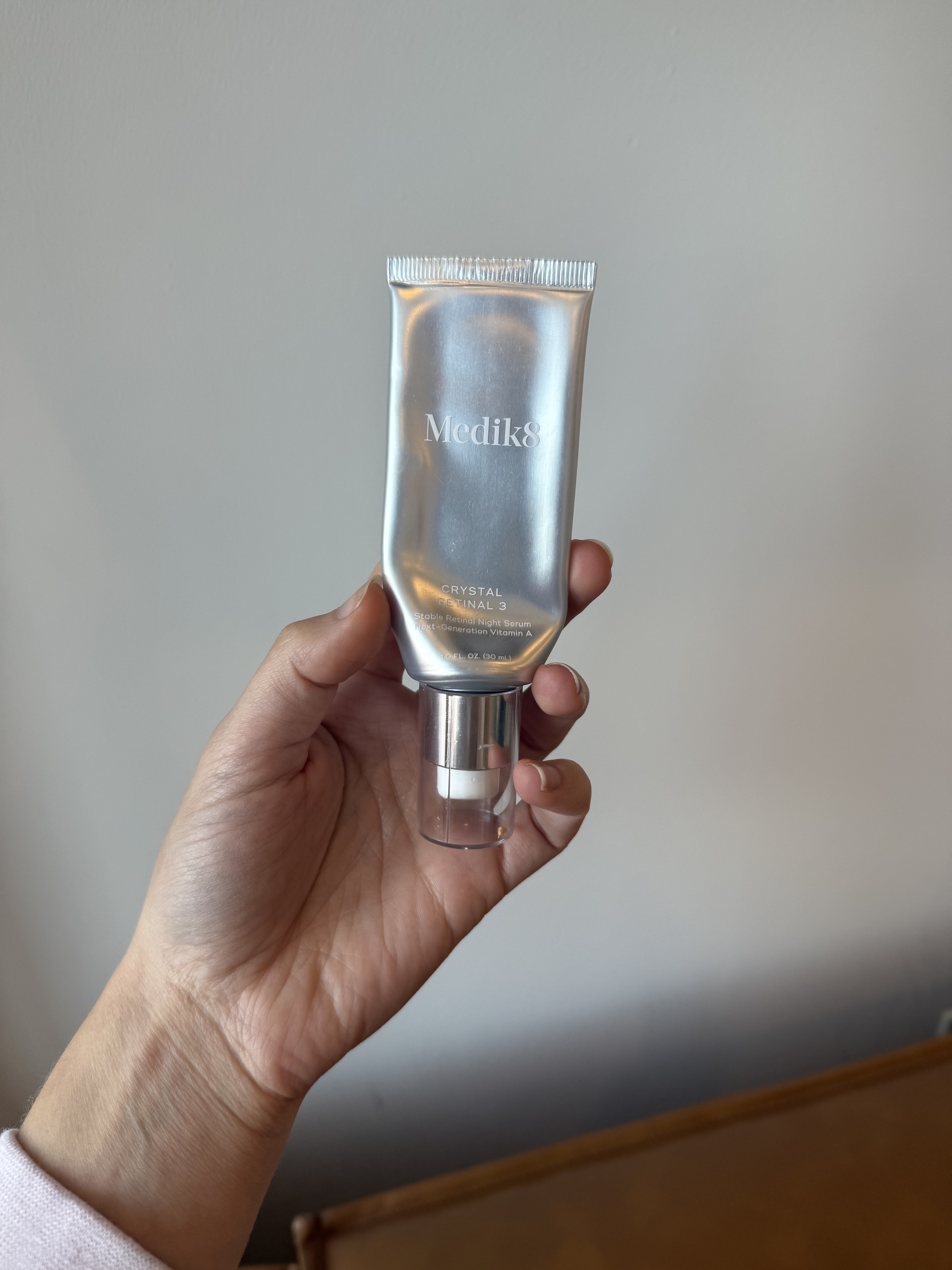 Photo of Jamie Schneider using MediK8's retinol