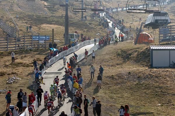 Riders receive encouragement as they make their way to the finish on the Cuitu Negru climb.